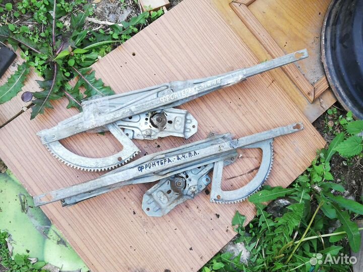 Стеклоподъемник двери Опель Фронтера А