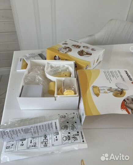 Молокоотсос medela электрический