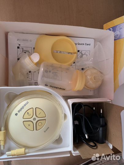 Молокоотсос medela электрический