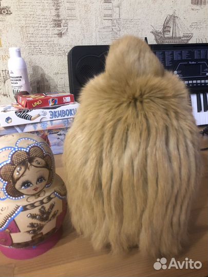 Шапка из вязанной норки с помпоном