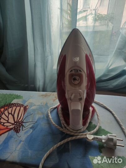 Гладильная доска и утюг