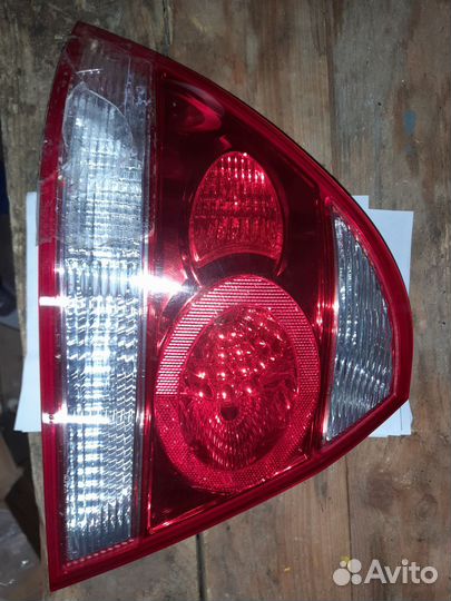 Фонарь задний левый Nissan Almera classic