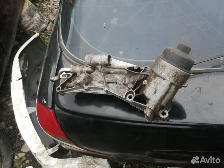 Корпус масленого фильтра Chevrolet Aveo Т250 F14D4