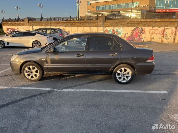 Mitsubishi Lancer 1.6 МТ, 2003, 400 000 км