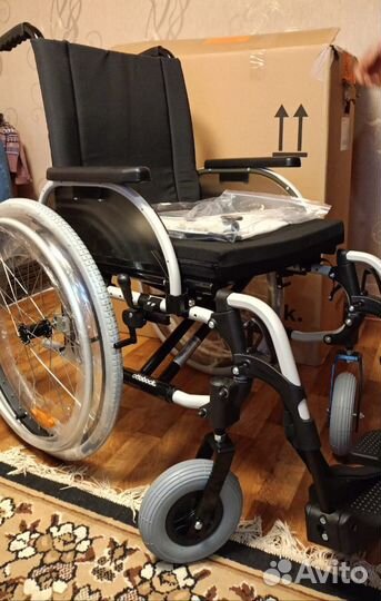 Инвалидная коляска новая