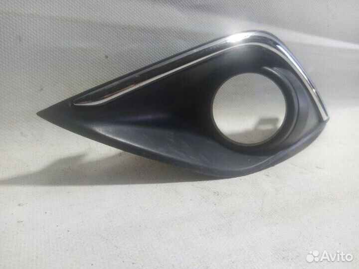 Накладка на туманку передняя левая Mitsubishi