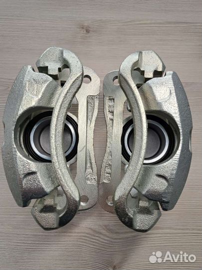 Комплект новых передних суппортов Акцент Тагаз