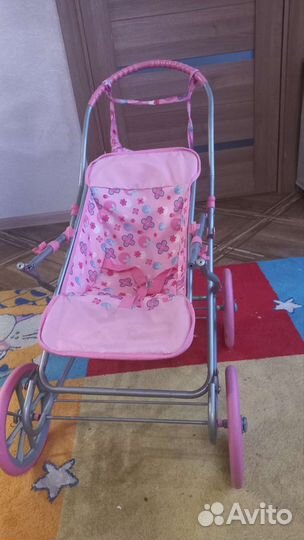 Игрушечная коляска для кукол