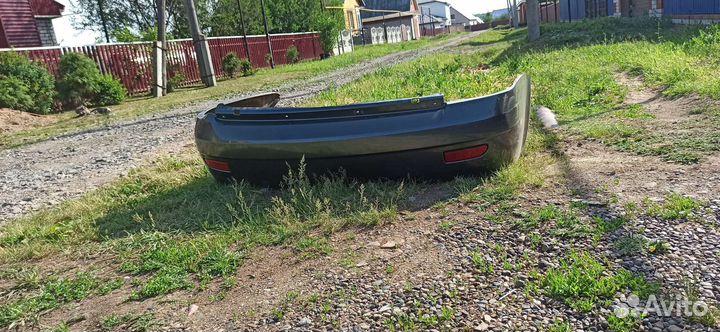 Задний бампер на priora