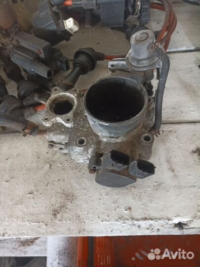 Дроссель Nissan Primera P11