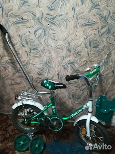 Детский велосипед с родительской ручкой