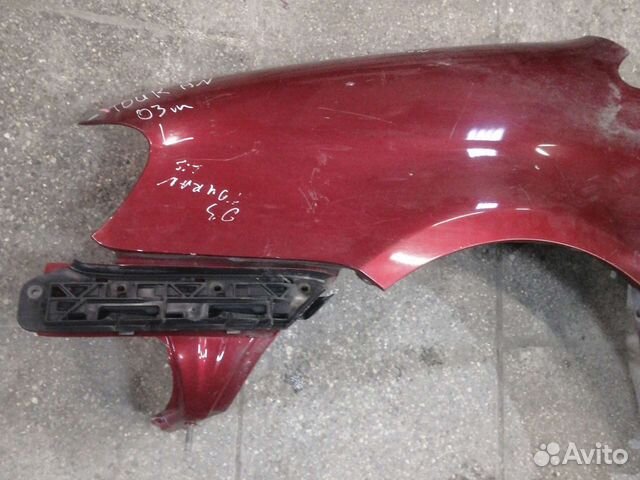 Кронштейн левого крыла Volkswagen Touran