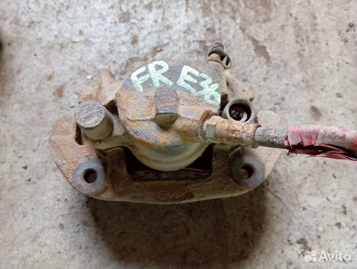 Тормозной суппорт передний левый правый BMW E36