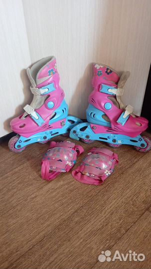 Продам ролики с наколенниками для девочки