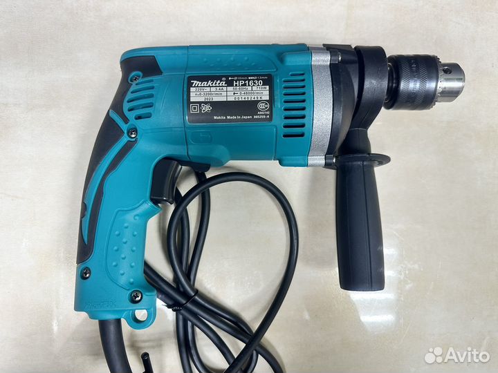 Ударная дрель makita