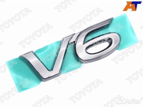 V6 шильдик