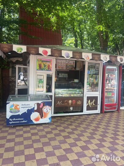 Продавец мороженого киоск