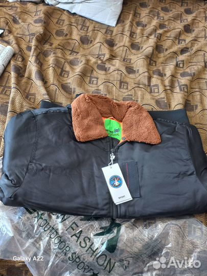 Продам новый бомбер 54р