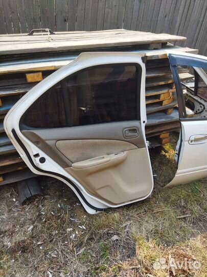 Двери на Nissan Sanny