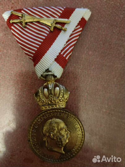 Медаль за