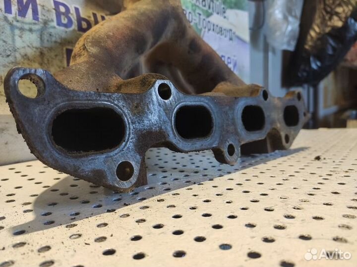 Коллектор выпускной Kia Spectra