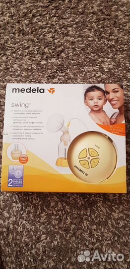 Молокоотсос medela swing электрический