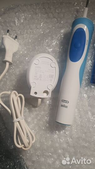 Новая электрическая зубная щетка Braun Oral-B
