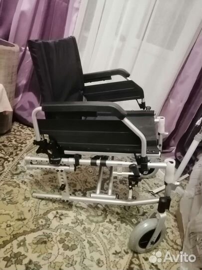 Инвалидная коляска
