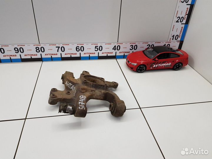 Кулак задний левый