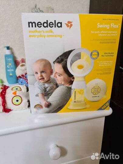 Молокоотсос medela swing flex электрический