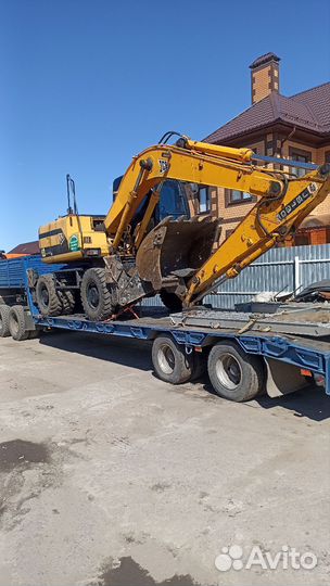 Полноповоротный экскаватор колесный