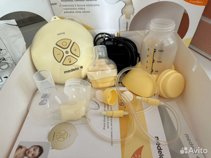 Молокоотсос medela swing электрический + пакеты