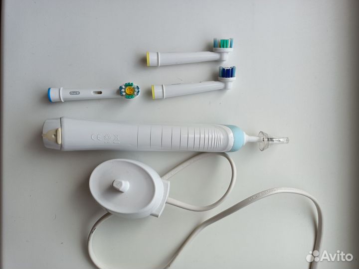 Электрическая зубная щетка braun oral b