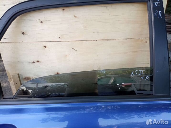 Стекло двери задней правой Kia Sportage II 2008