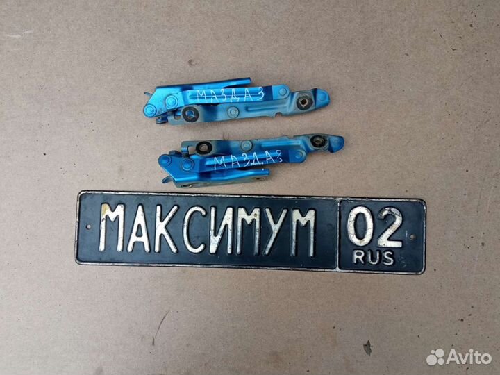 Петля багажника Мазда 3 BK седан