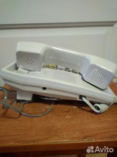 Телефон Panasonic и Telcom