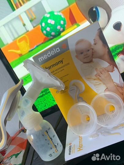 Молокоотсос medela с доп. воронкой(торг)