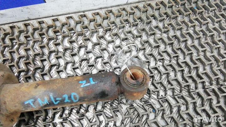 Стойка амортизатора заднего левого Nissan Almera