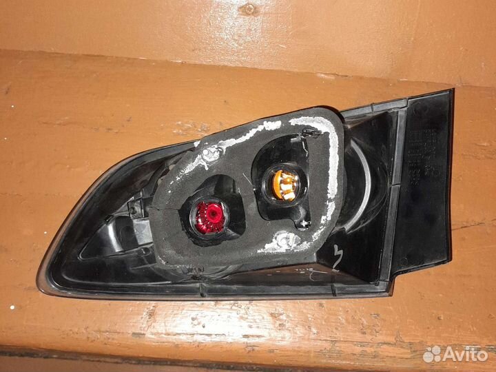 Фара задняя в левое крыло mazda 3 вк седан