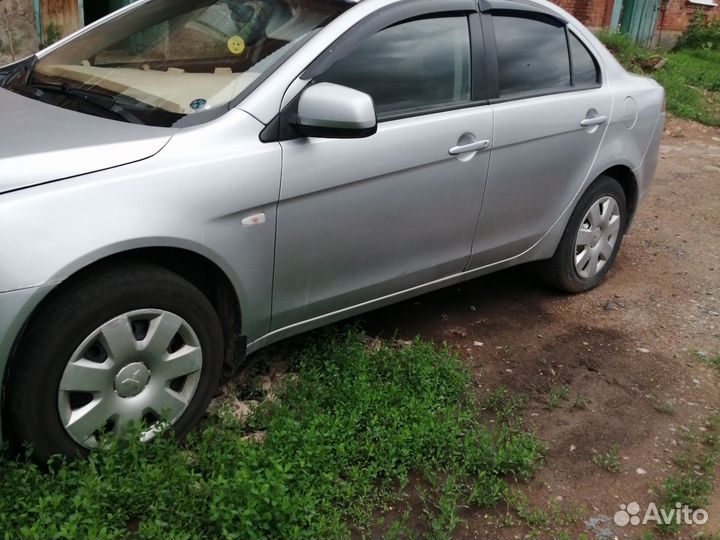 Mitsubishi Lancer 1.5 МТ, 2011, 135 000 км