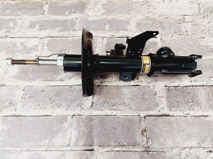 SRX Cadillac амортизатор передний