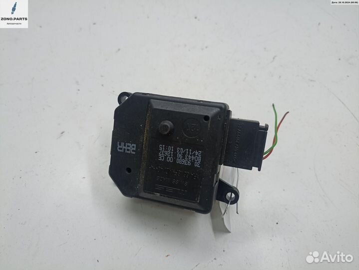 Моторчик заслонки отопителя 9012637 на Opel Astra G