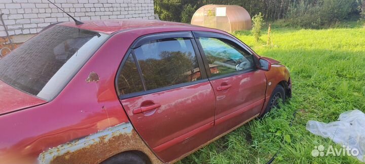 Mitsubishi Lancer 1.6 МТ, 2006, битый, 300 000 км