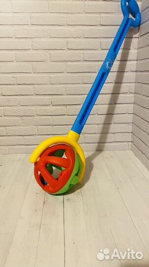 Игрушка каталка