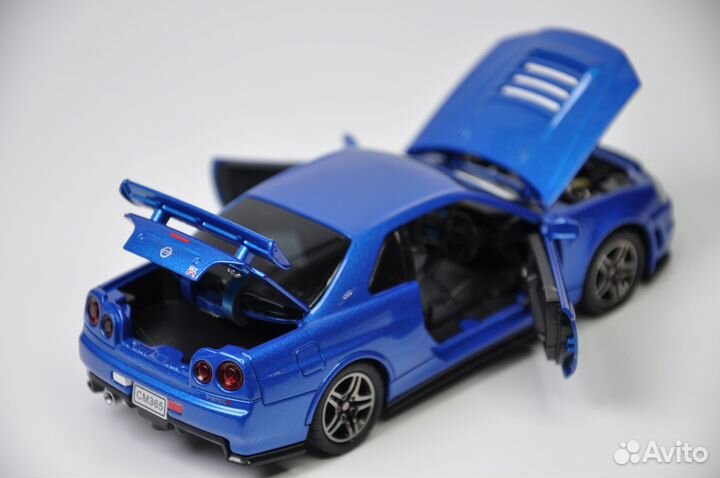 Модель авто Nissan Skyline GT-R R34 1:32 меатлл