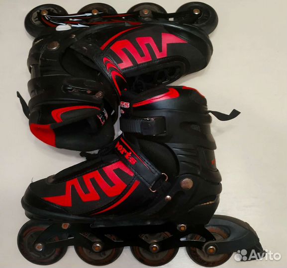 Роликовые коньки