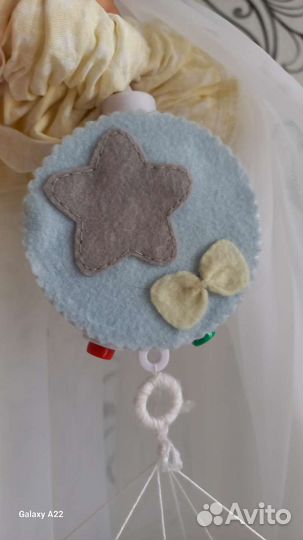 Музыкальный мобиль на кроватку