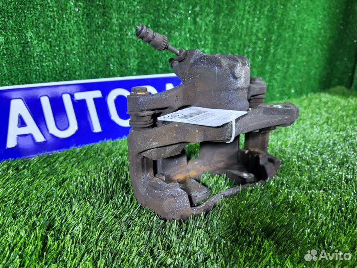 Суппорт тормозной передний левый Peugeot 207