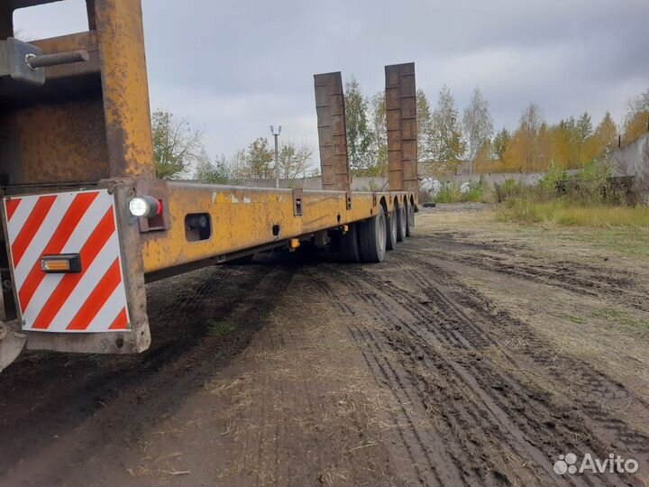 Полуприцеп трал (тяжеловоз) Политранс ТСП 94184, 2011