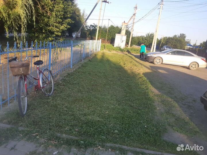 Покос травы триммер